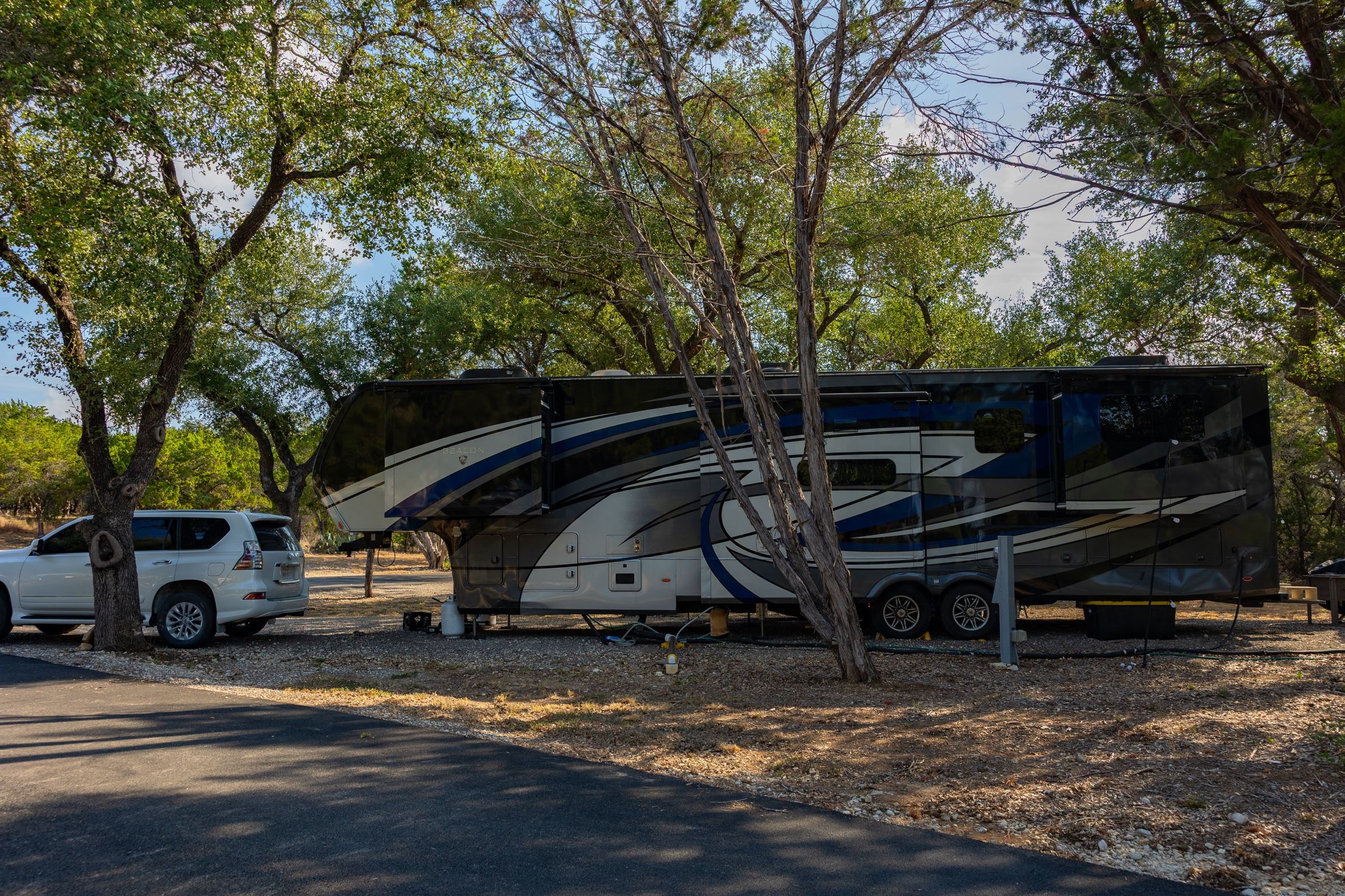 Fifth-wheel on a shaded back-in site